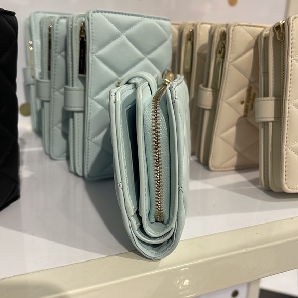 Kate Spade Carey Medium Compartment Bifold Wallet
COLOR: Turquoise - Picture 11 of 16